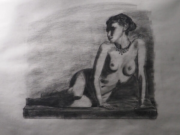 Kneeling woman with necklace