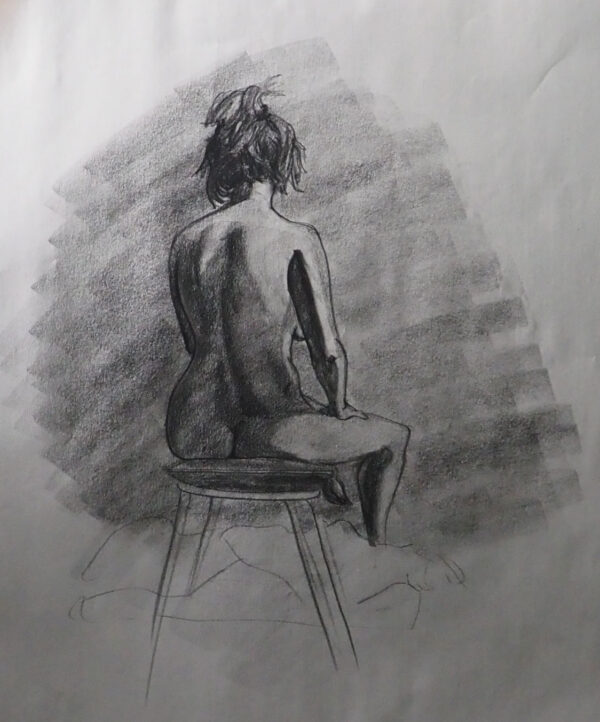 Nude woman on stool