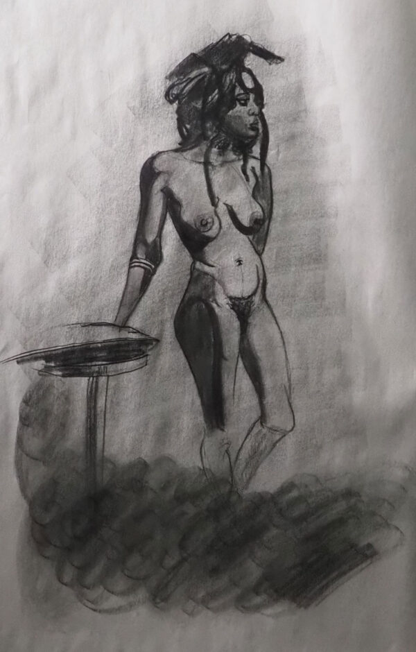 Standing figure with stool